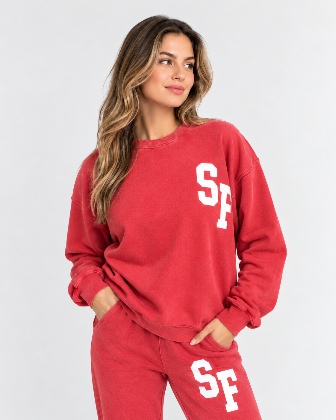 Woman wearing the SF Home Uniform crewneck in vintage red, front view