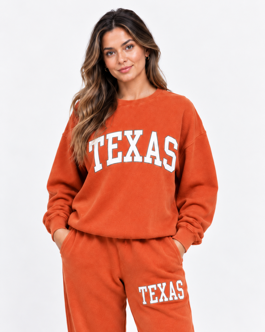 Woman wearing the Texas Home Uniform crewneck in vintage orange