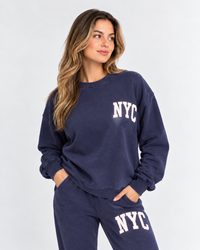 Woman wearing the NYC Home Uniform crewneck in vintage navy